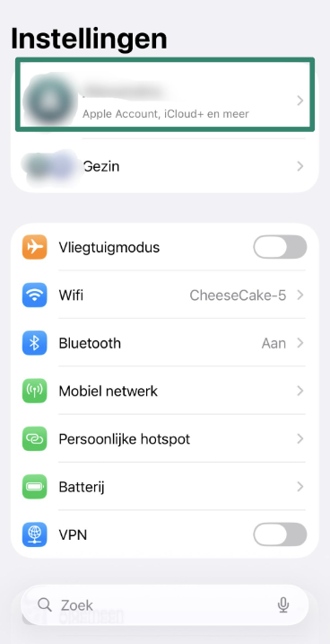iPhone Settings screen with Apple ID option highlighted.